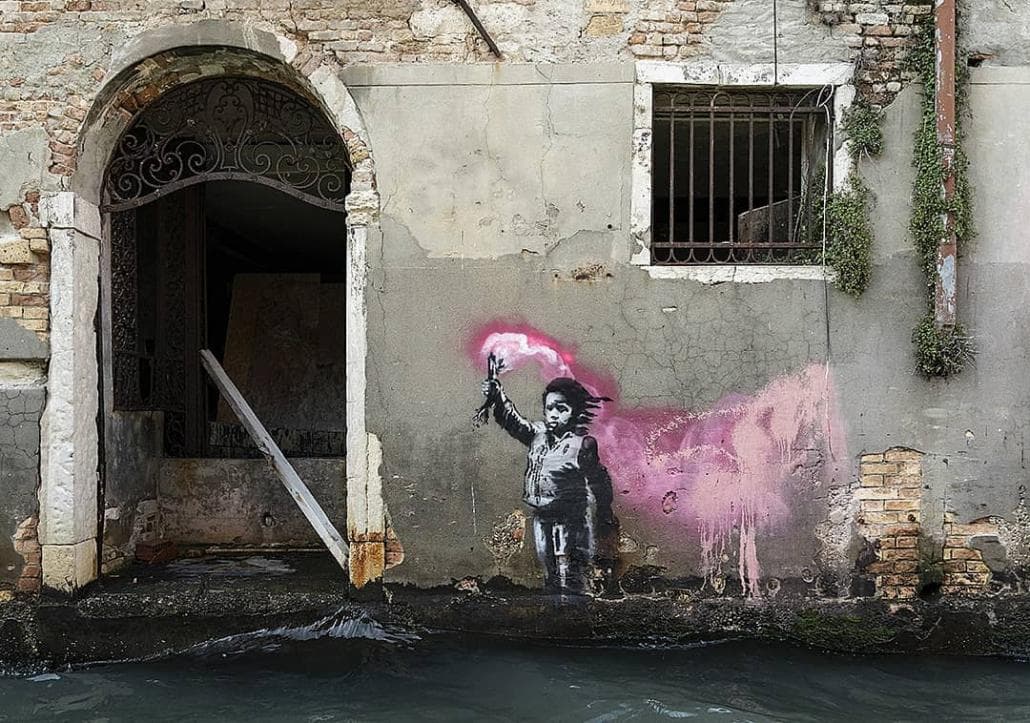 Banksy mural of a child holding a rescue flare, Venice
